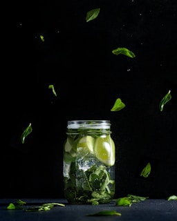 sliced lime in clear glass jar
