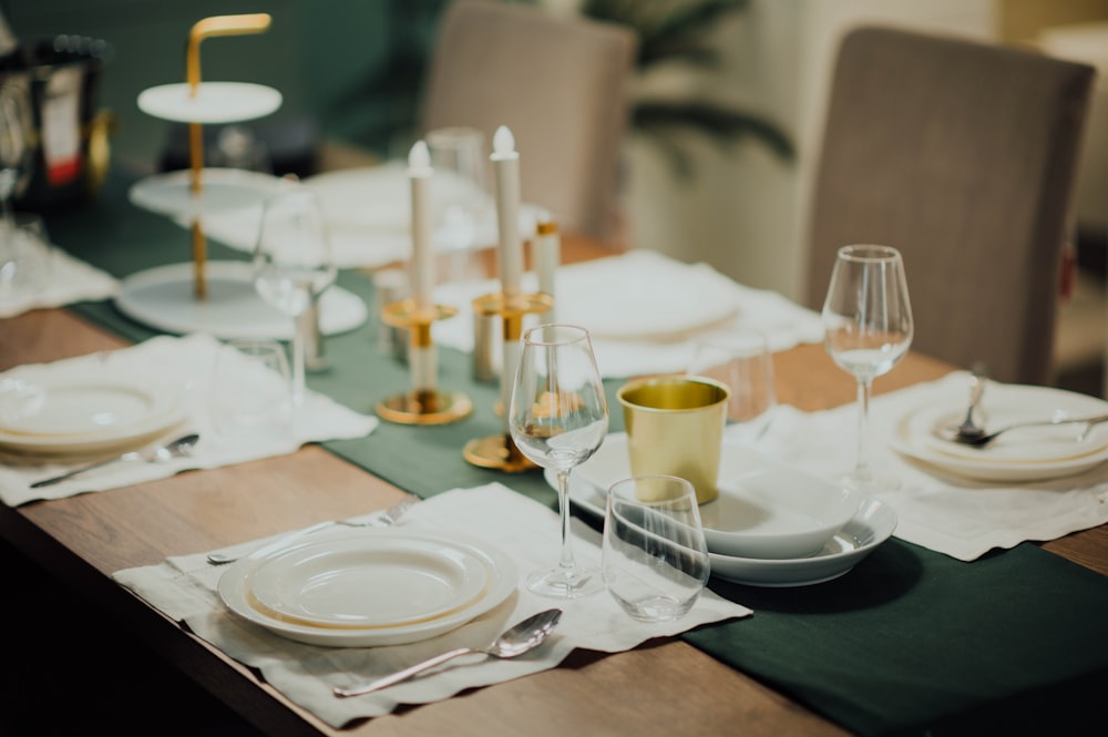 white ceramic dinnerware set on brown table