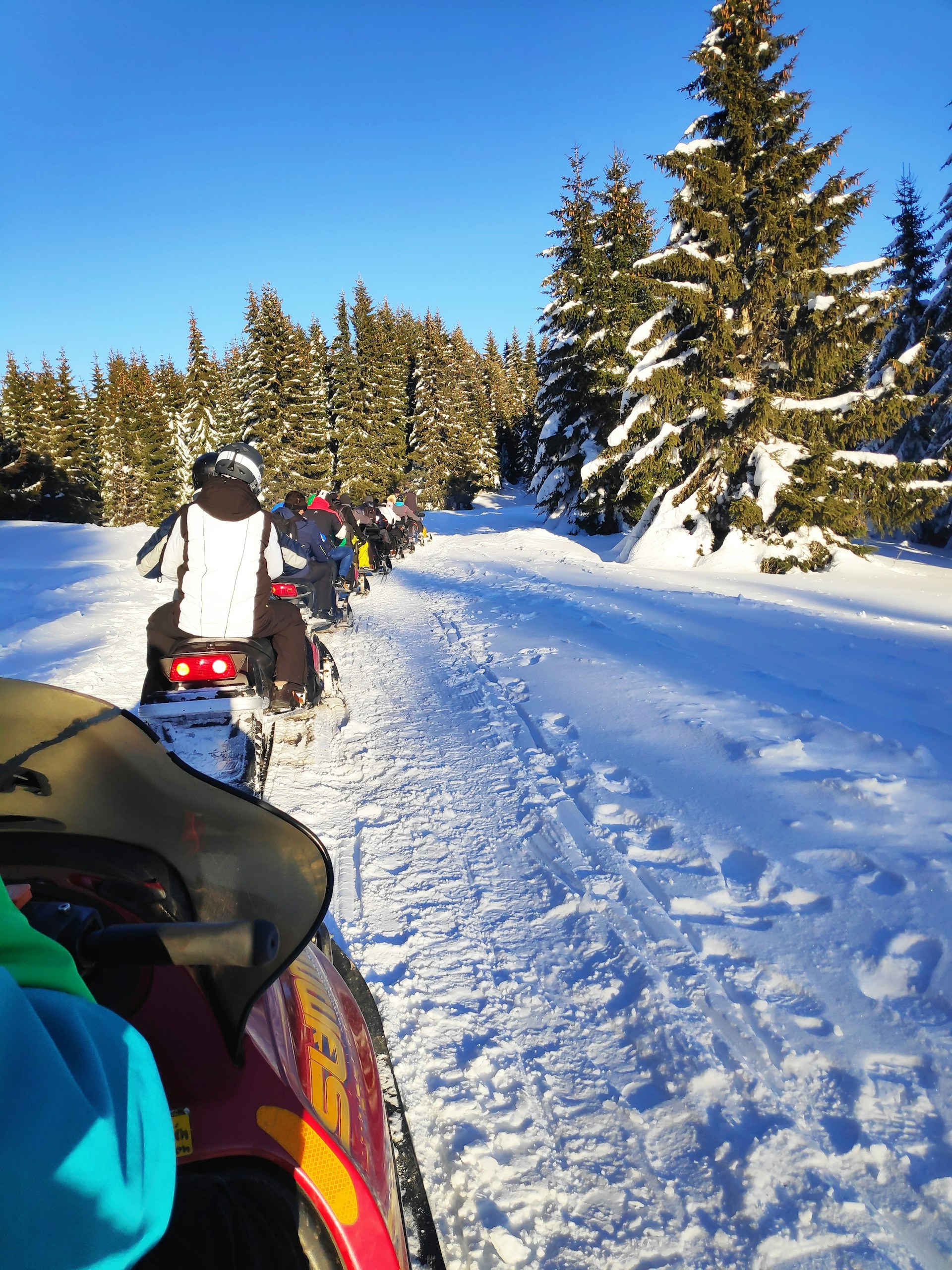 woman wearing yellow long-sleeved dress under white clouds and blue sky during daytime