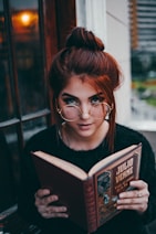 woman holding book