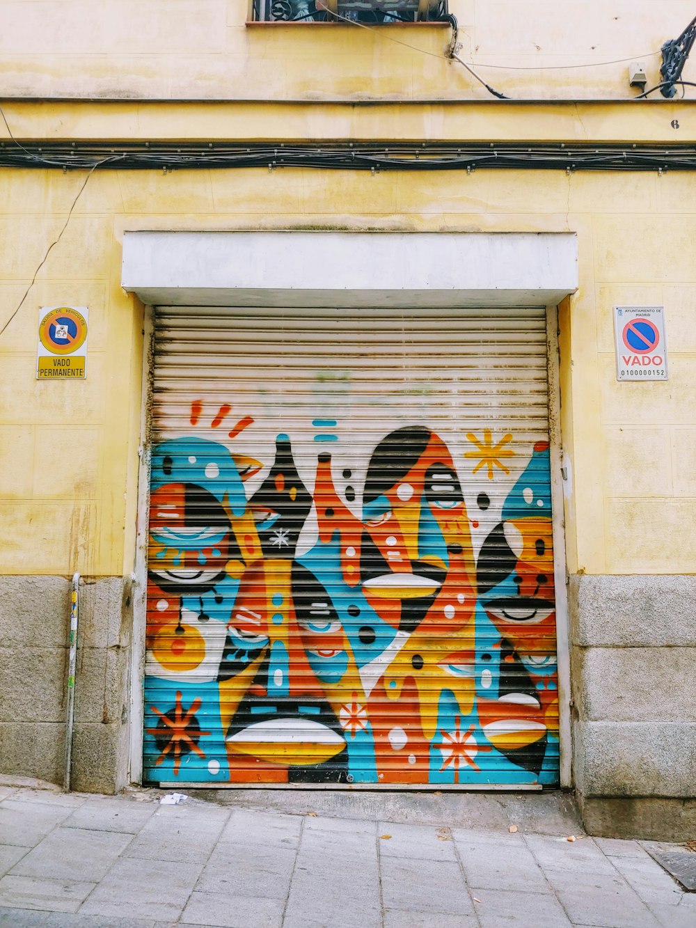 multicolored mural roll-up door