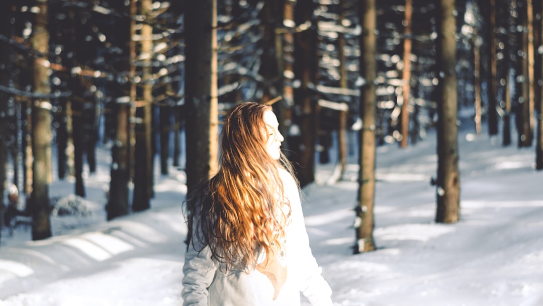 woman standing near forest