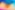a blurry image of a rainbow colored background