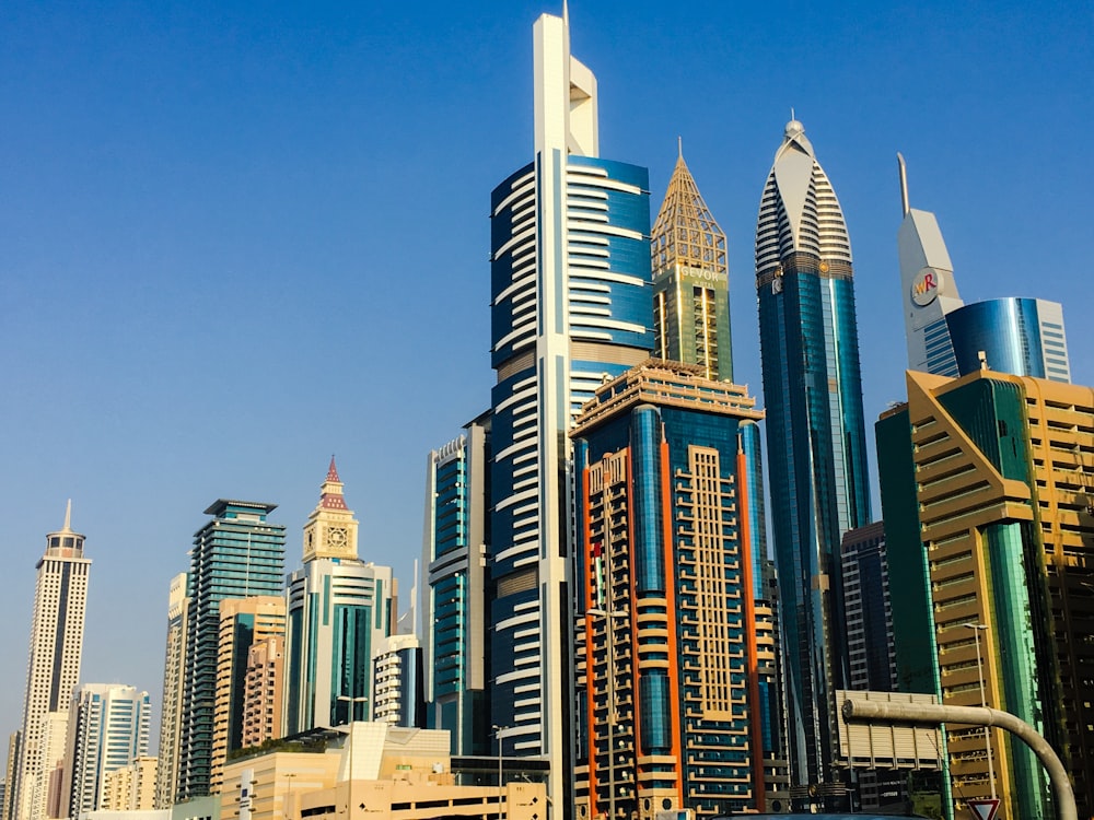 high-rise buildings under blue sky