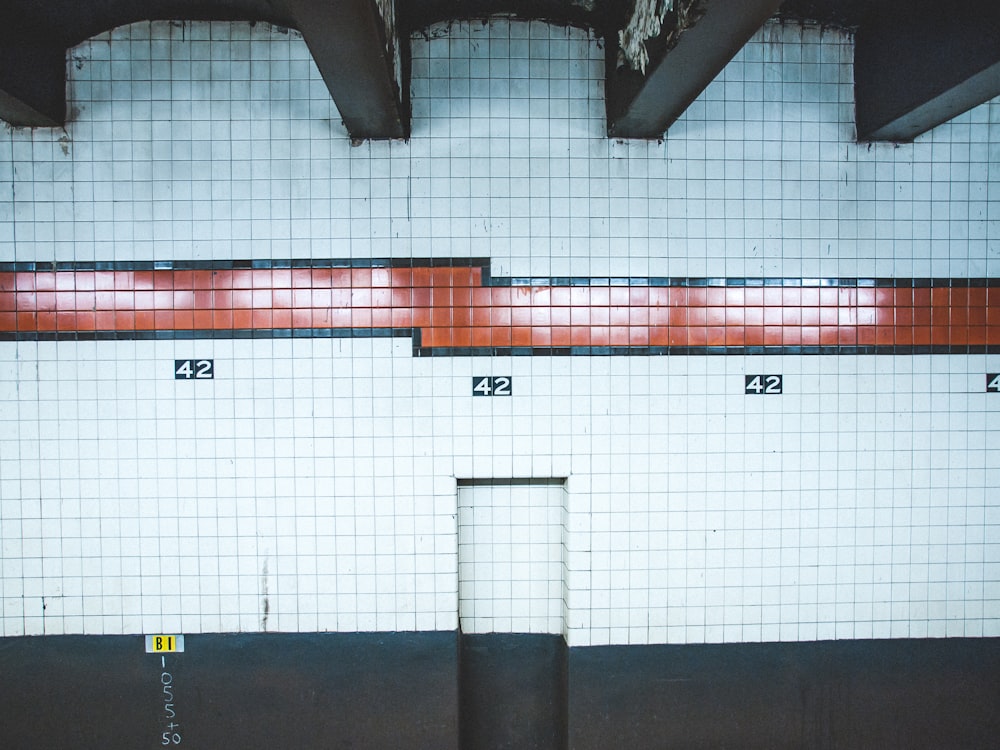 white and orange concrete wall