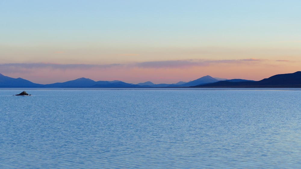 calm water at the beach during golden hour