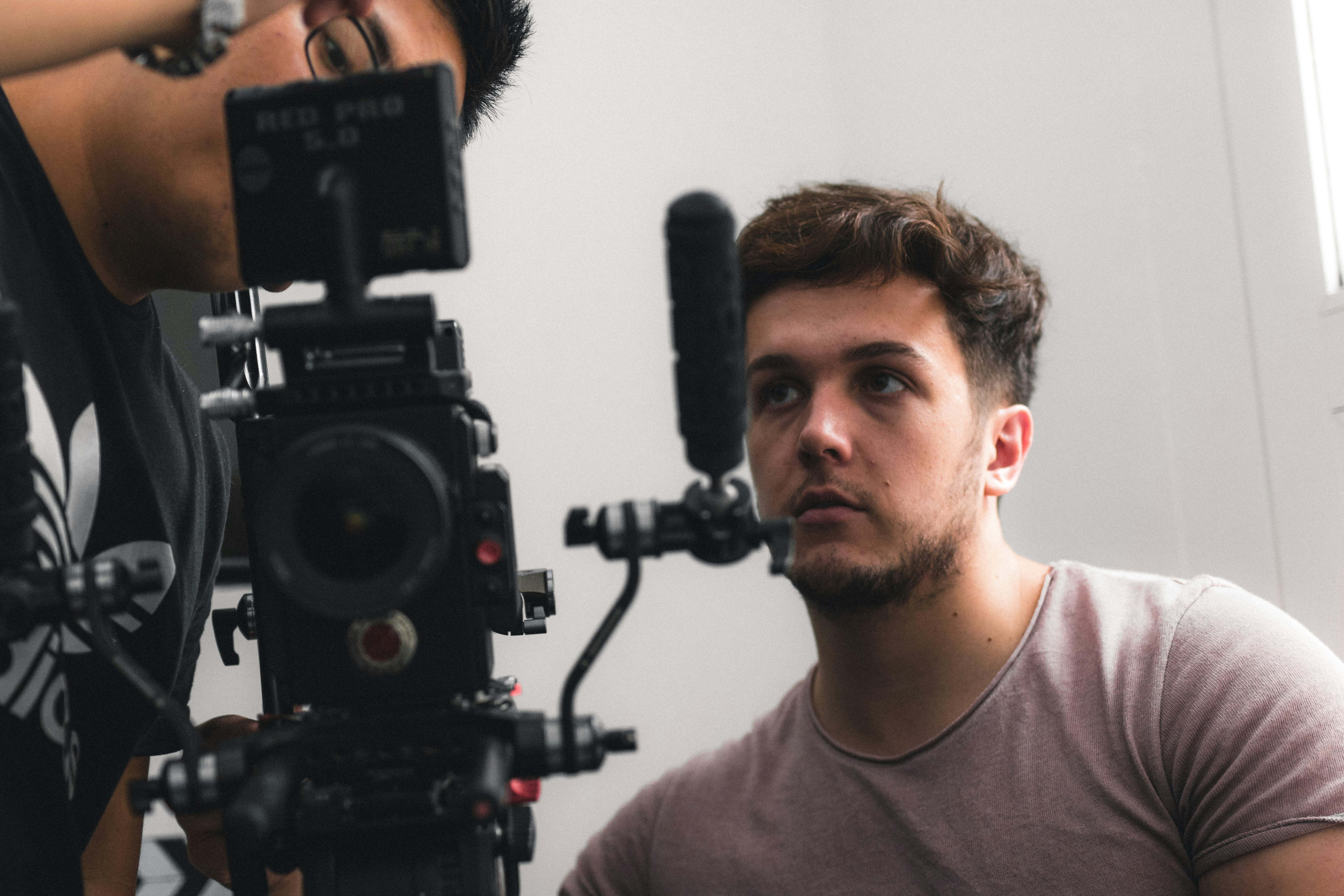 two man staring at camera