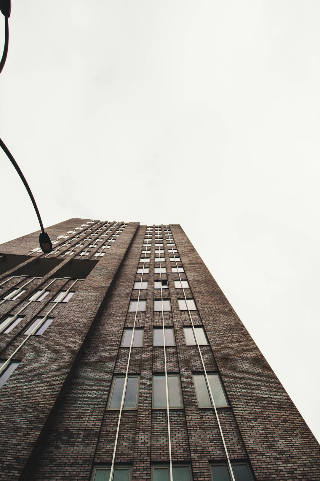 low-angle photography of brown concrete building