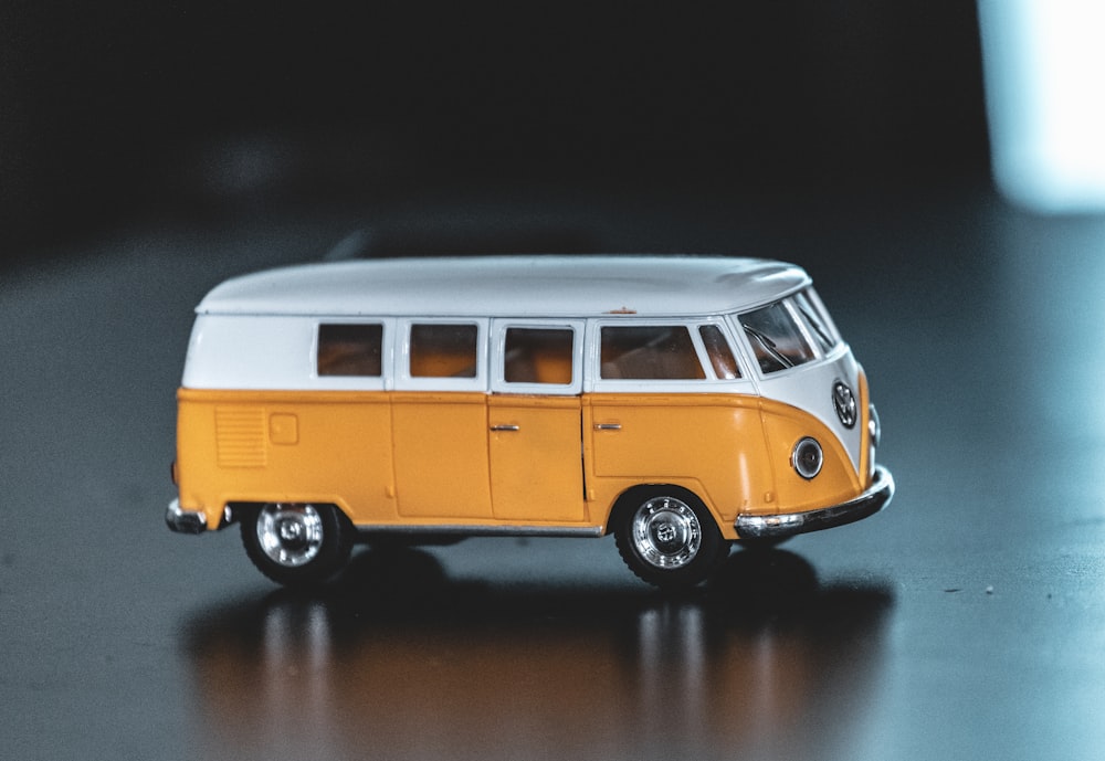 yellow and white Volkswagen T1 scale model