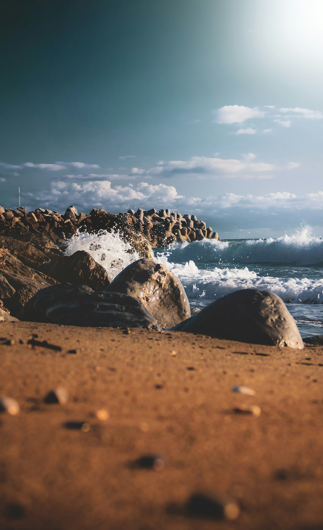 sea waves hitting on rock formations