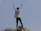 Happy person celebrating personal growth and empowerment outdoors