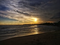 A captivating sunset over a tranquil beach in Sri Lanka.