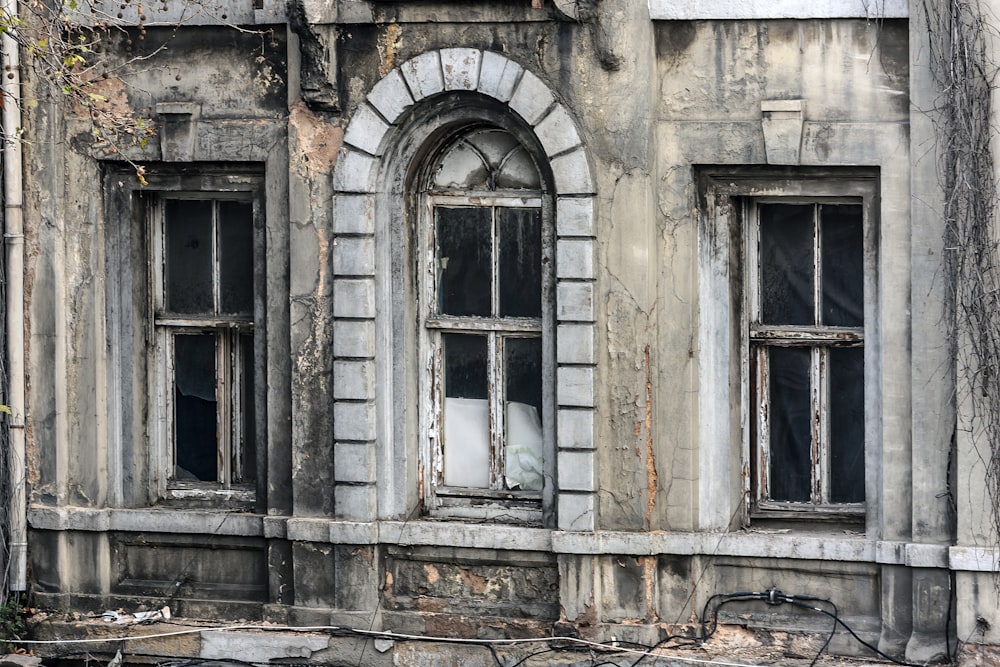 three white wooden windows