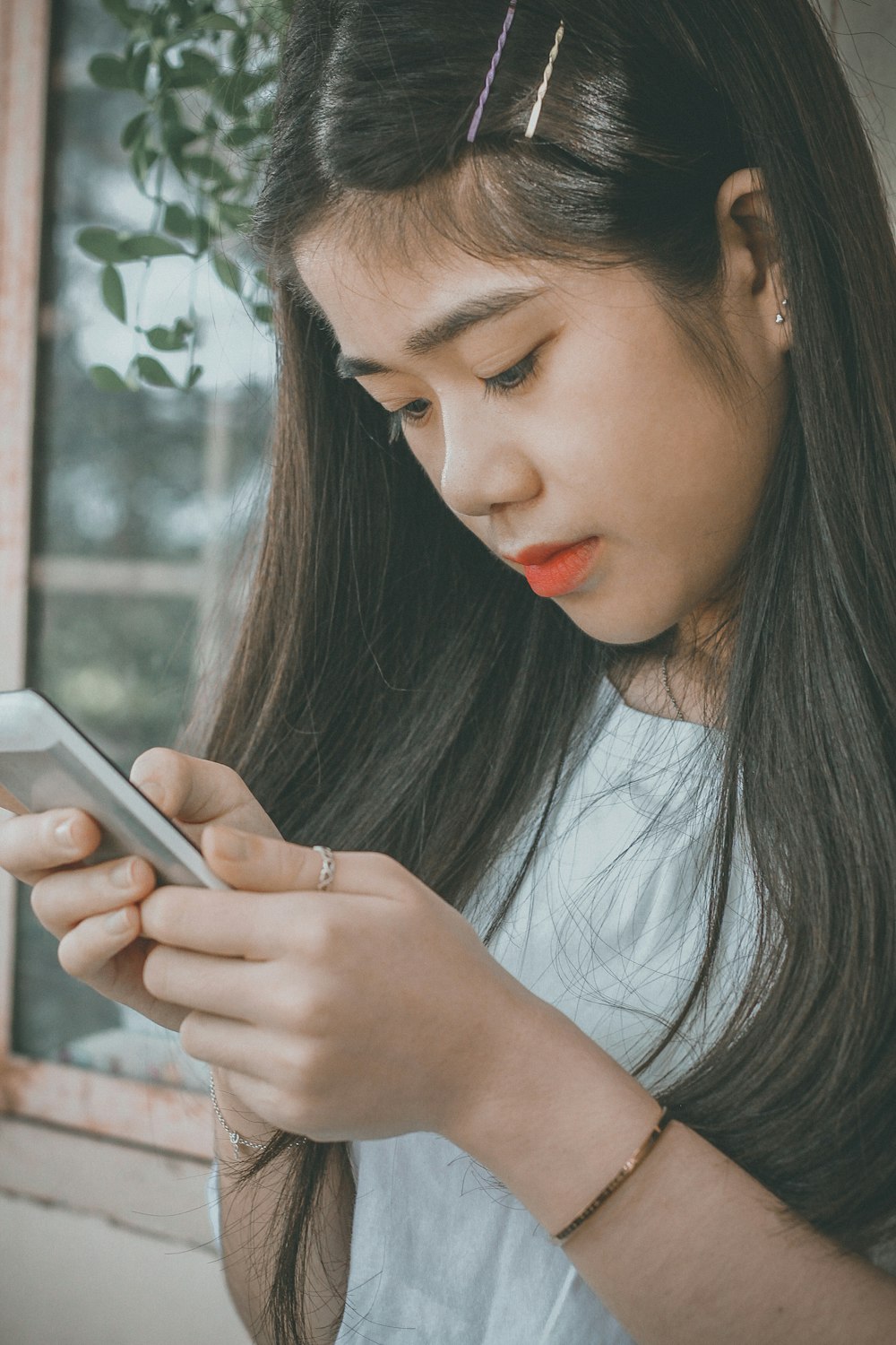 woman looking at phone