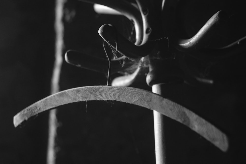 a black and white photo of a pair of scissors