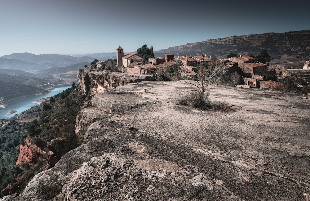 brown houses on cliff