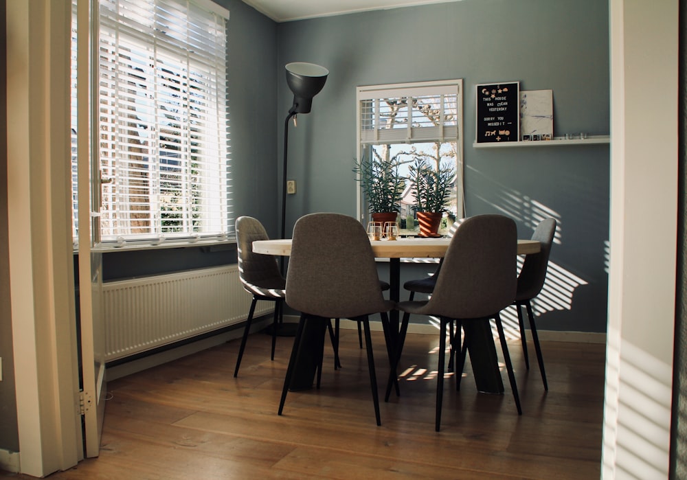 round white table across black upright lamp