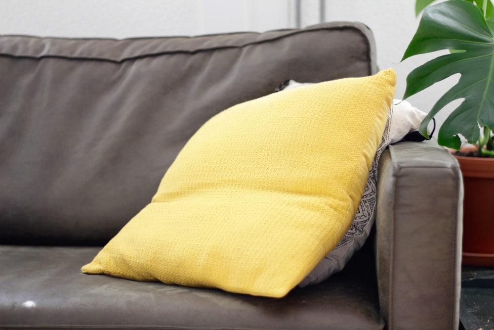 yellow throw pillow