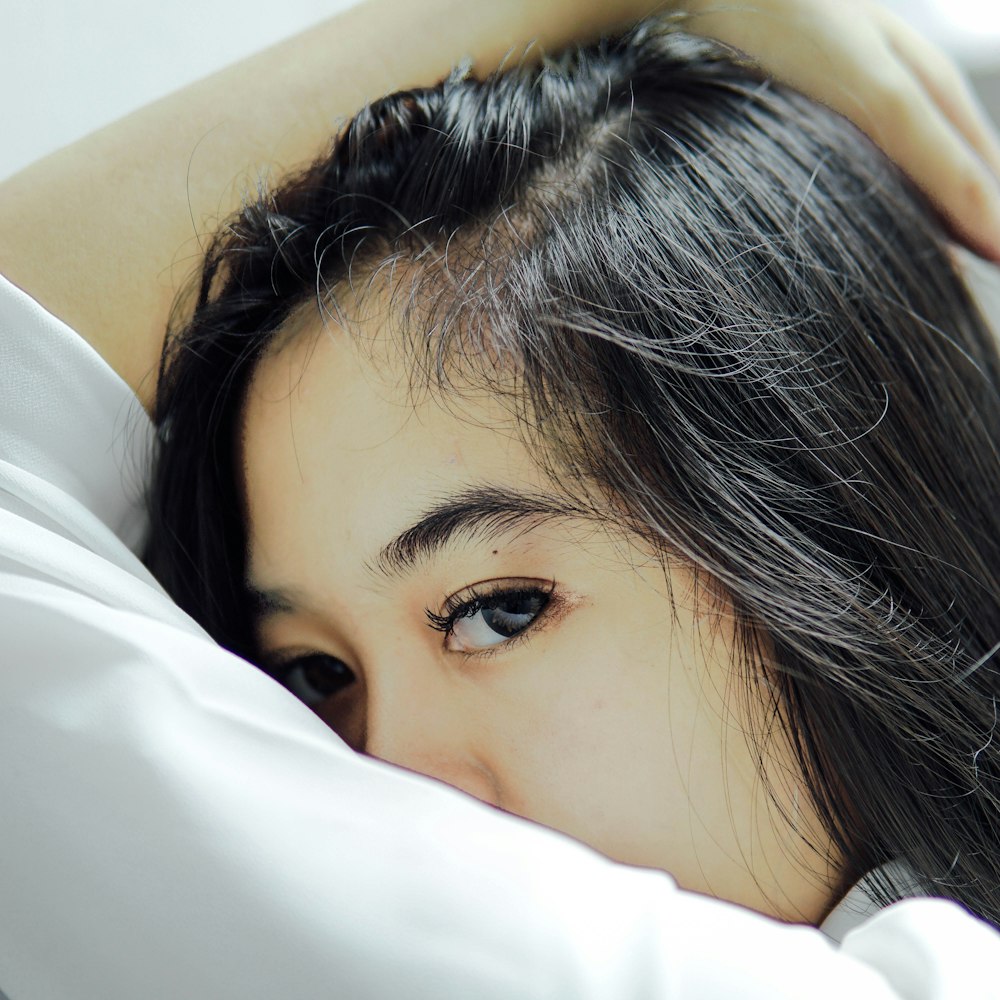 woman in white shirt in selective focus photography