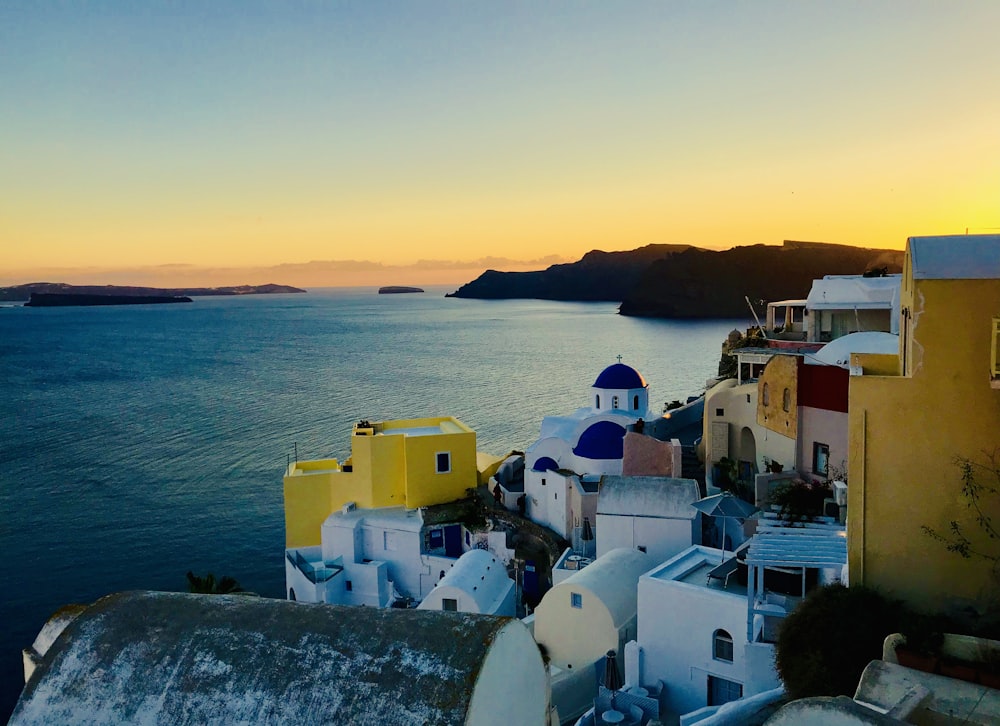 yellow building across body of water