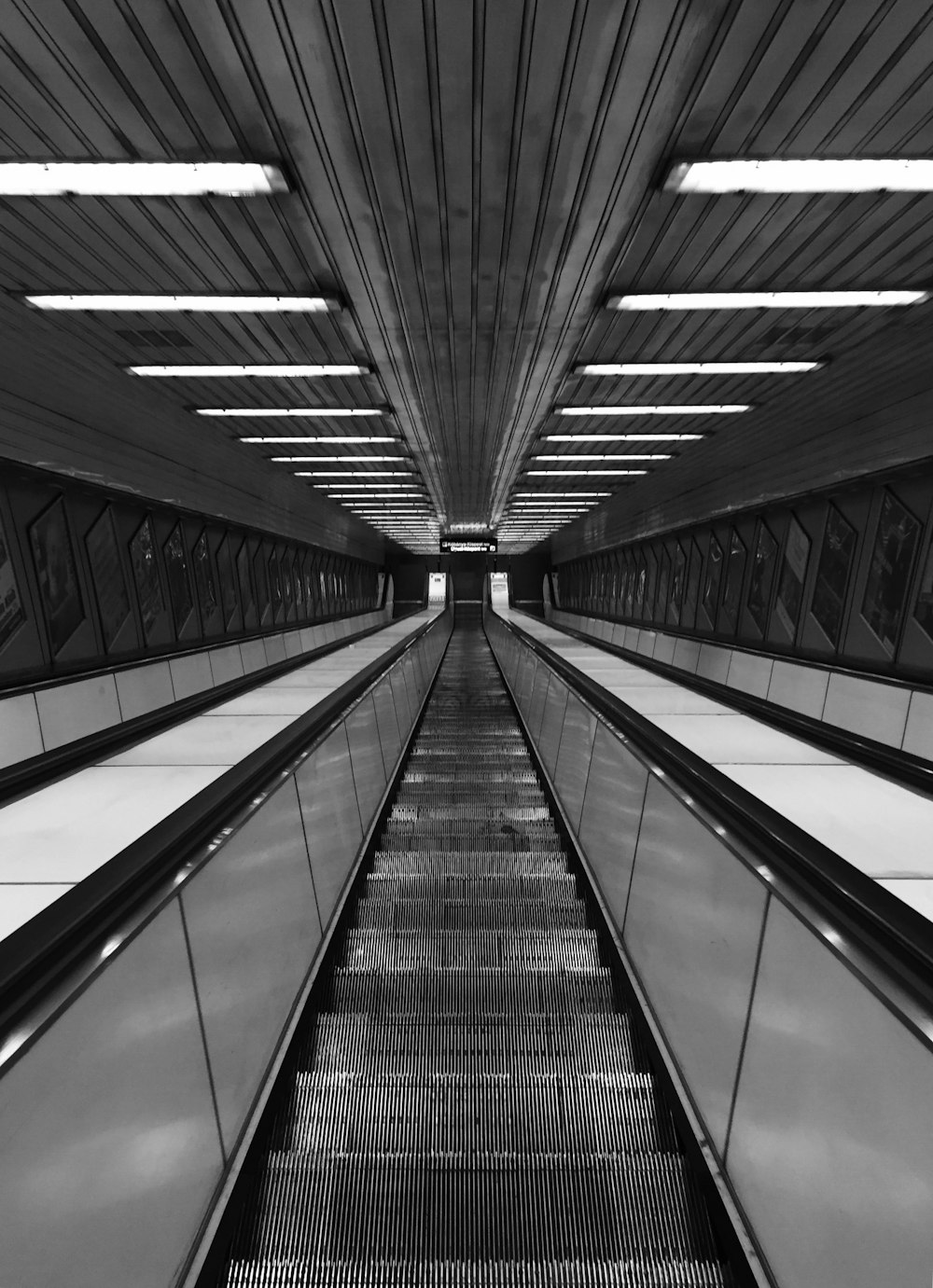 gray empty escalator