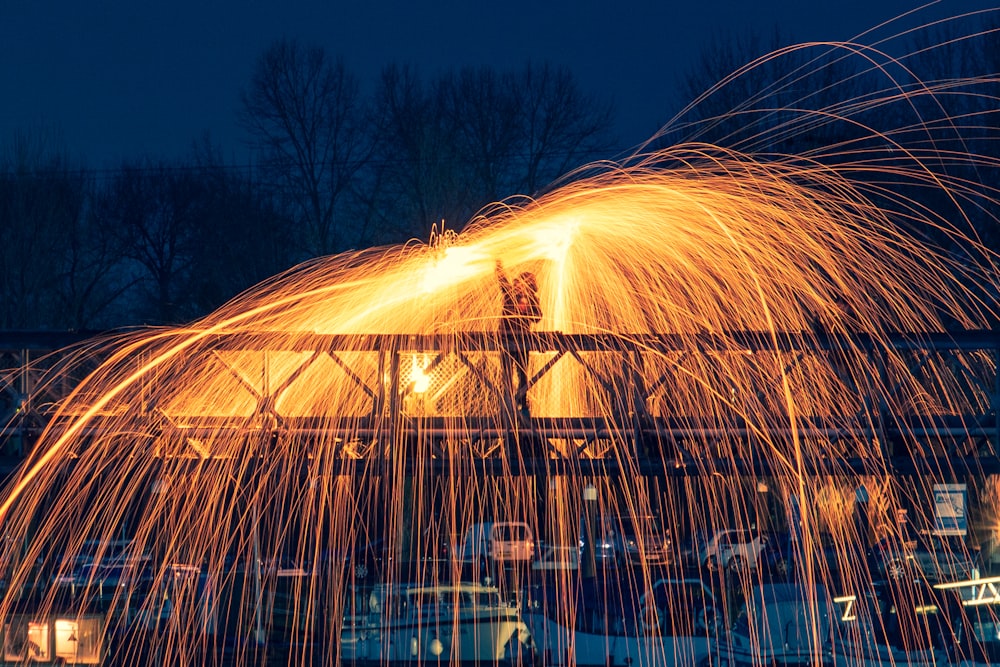 woman in jacket playing sparks