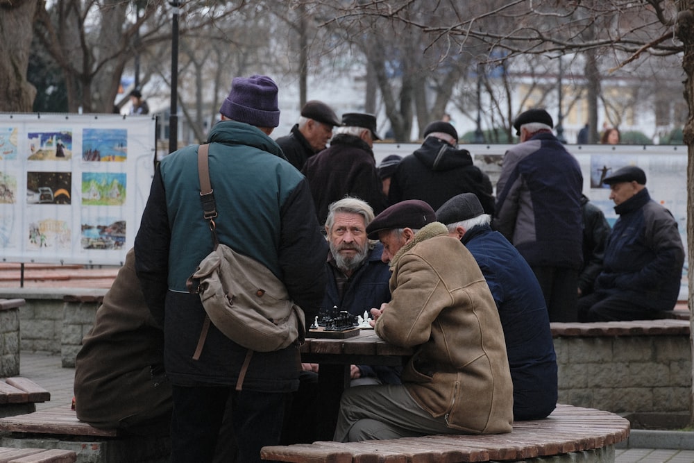 group of men sitting table