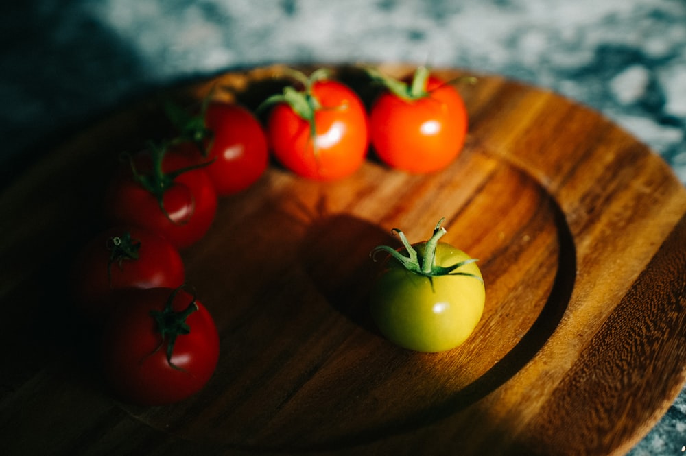 tomatoes on brown plate