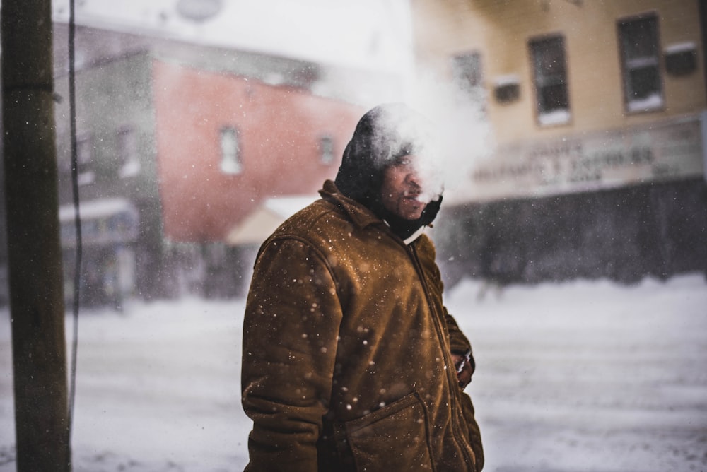 man smoking across building