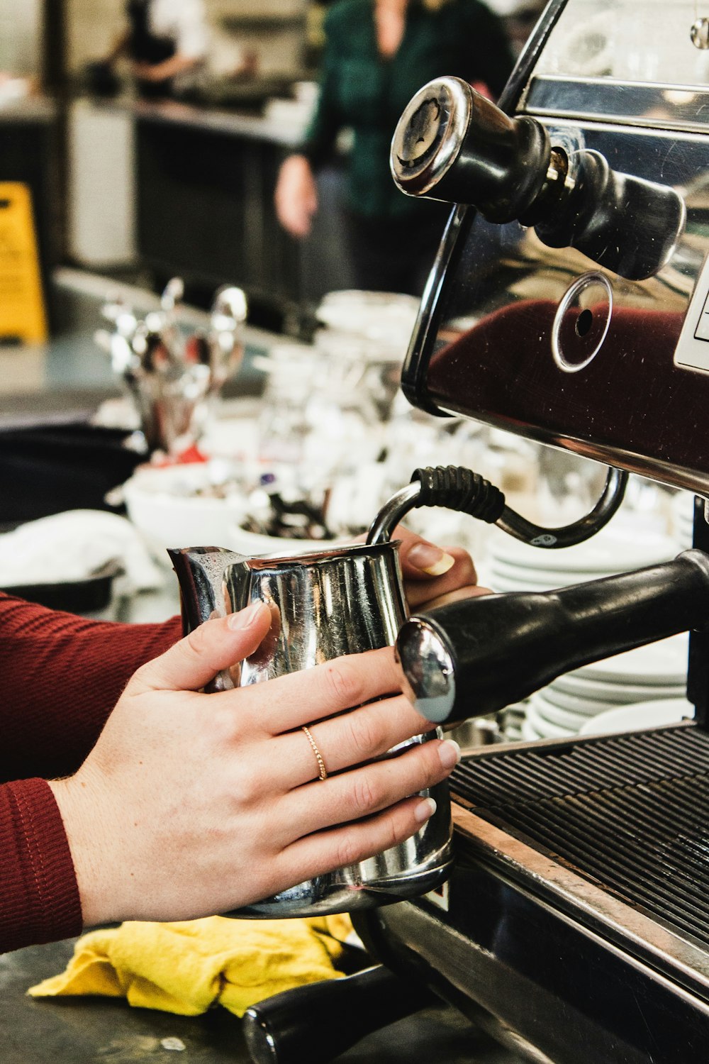 person making coffee