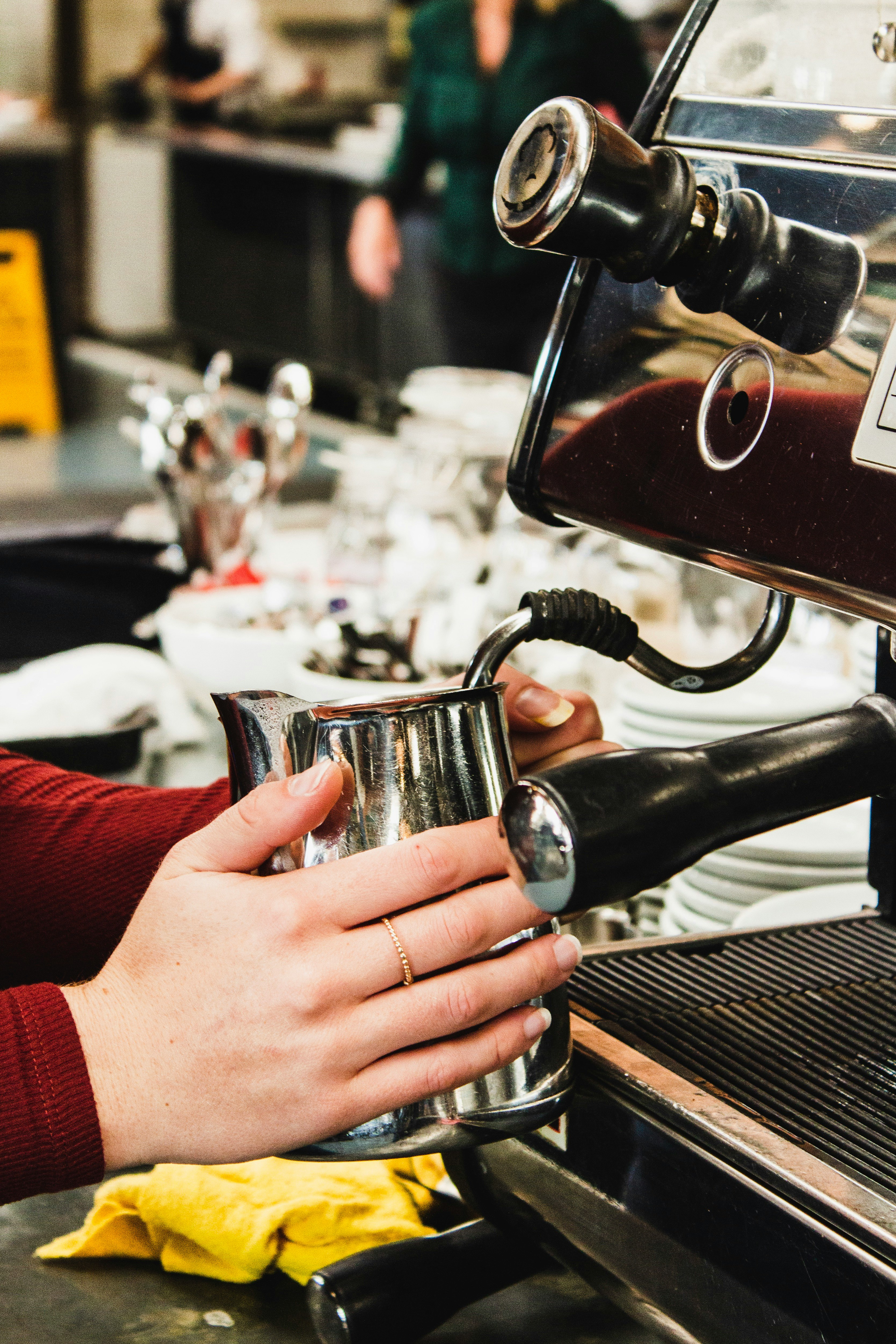 person making coffee