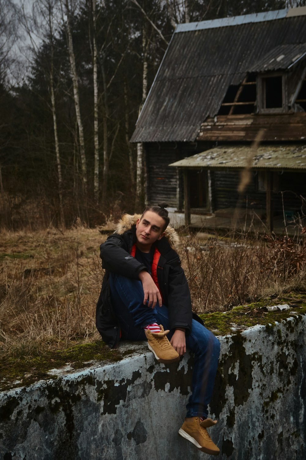 man wearing gray coat