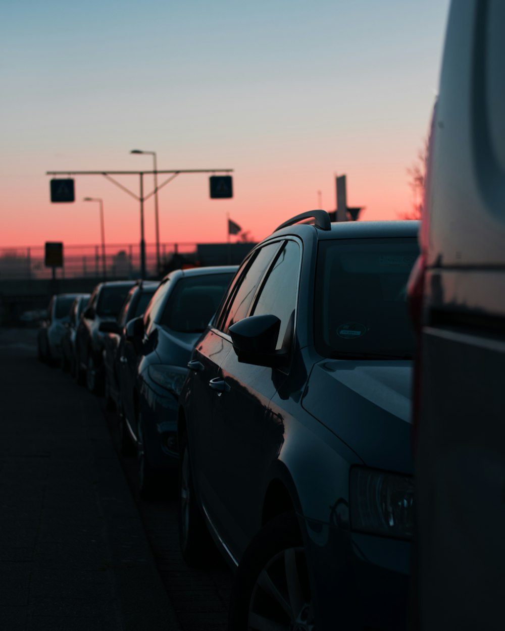 cars lining on street