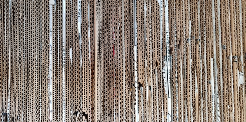 Stack of sturdy cardboard sheets ready for packaging