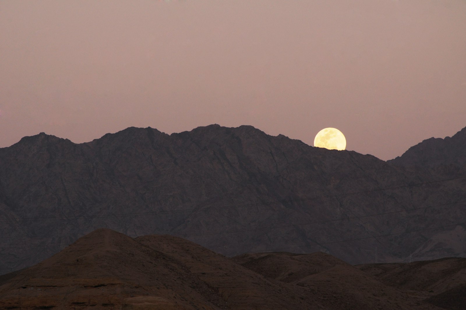 Nikon AF-S DX Nikkor 55-200mm F4-5.6G VR sample photo. Full moon over mountain photography