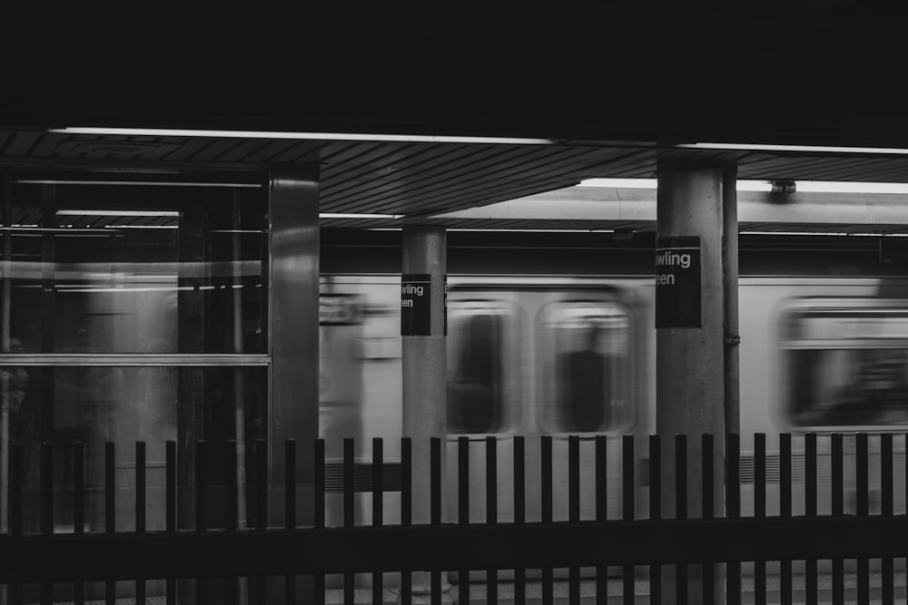a black and white photo of a subway