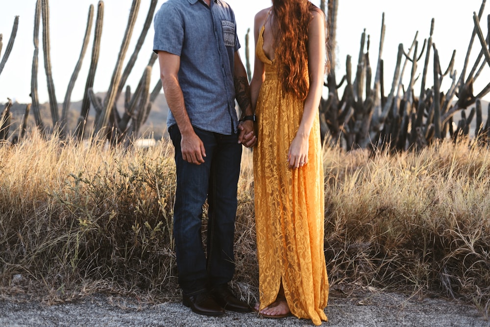 a man and a woman standing next to each other