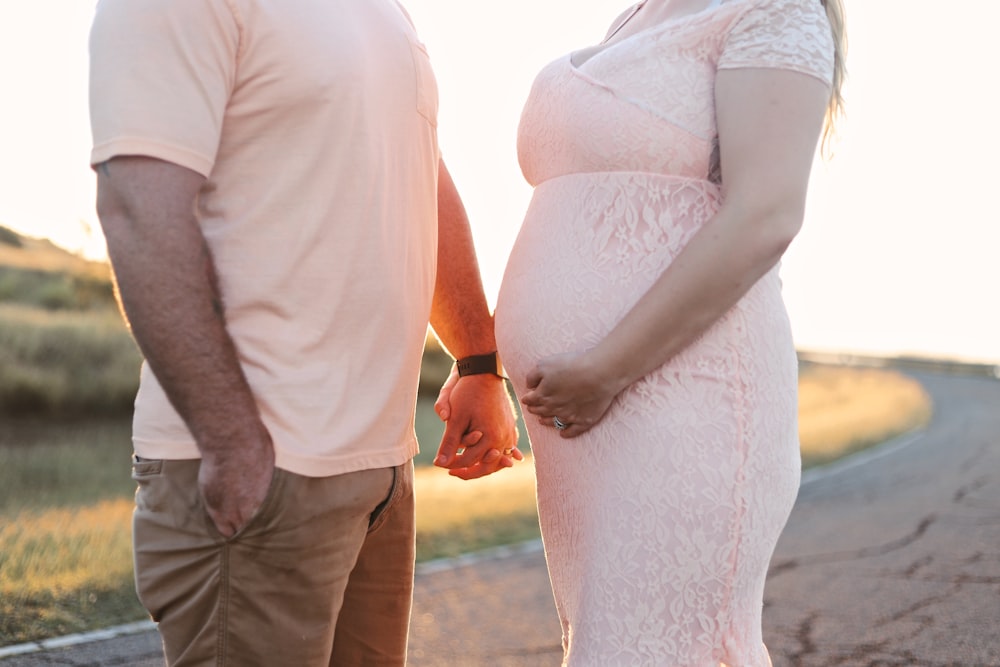 man holding woman's hand