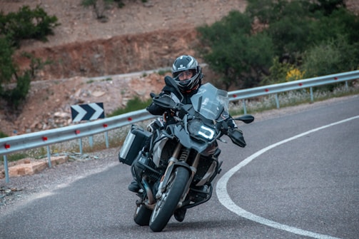man riding motor rider