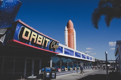 orbit cafe during daytime space shuttle teams background
