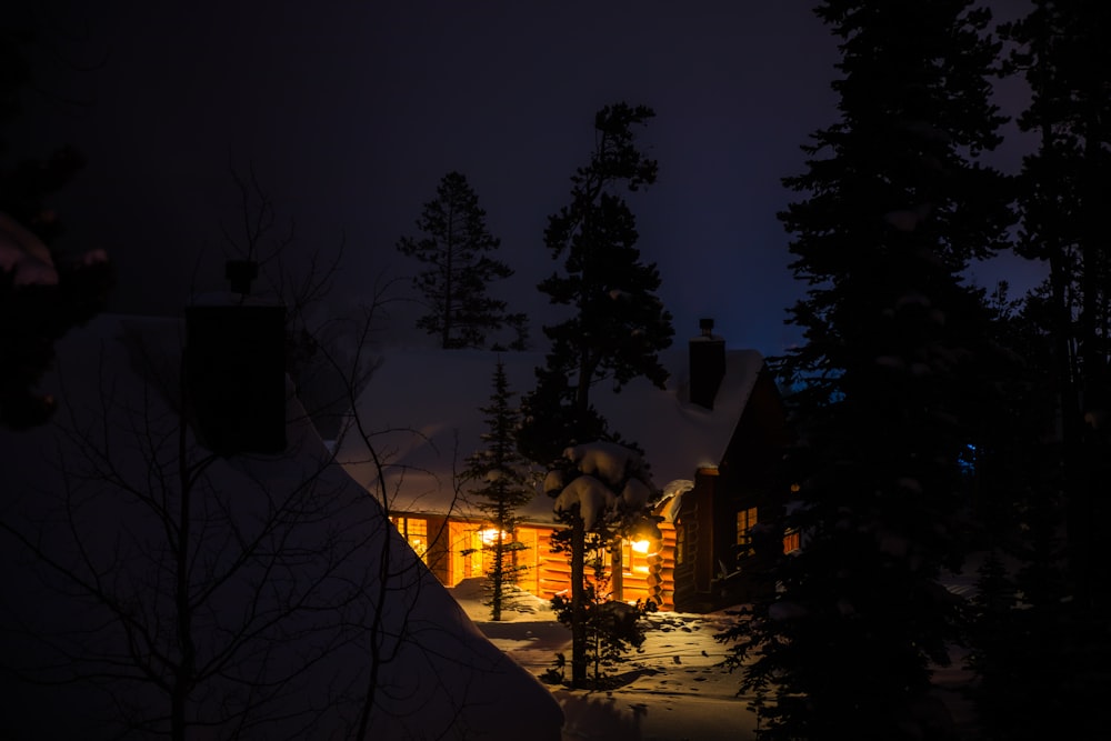 lighted lamp on house