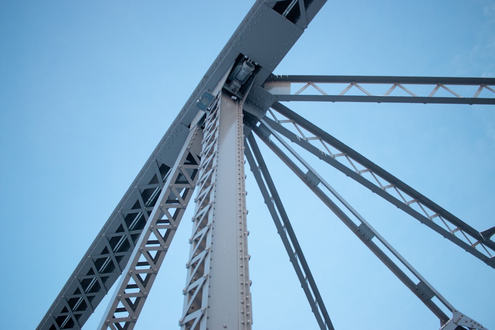 low-angle photography of white steel frame