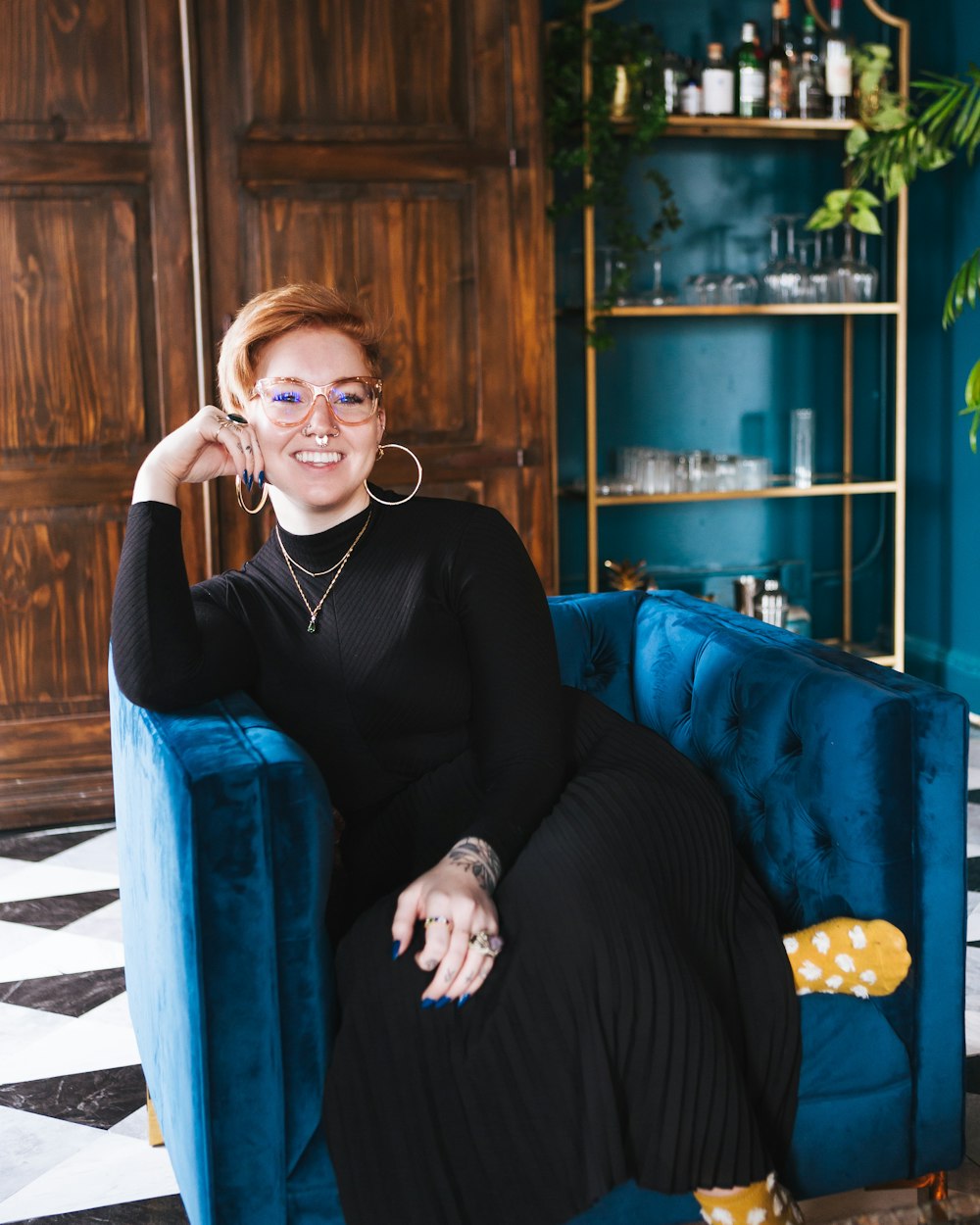 woman sitting on sofa chair