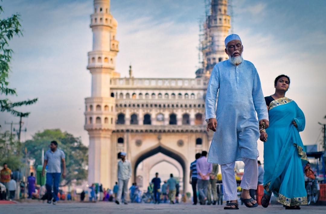 people walking near mosque during daytime