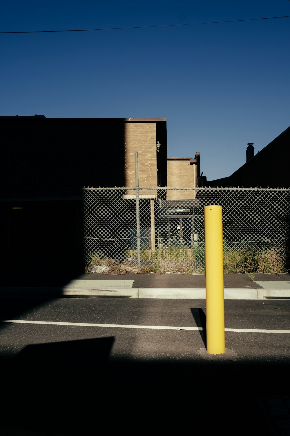 gray metal fence near house