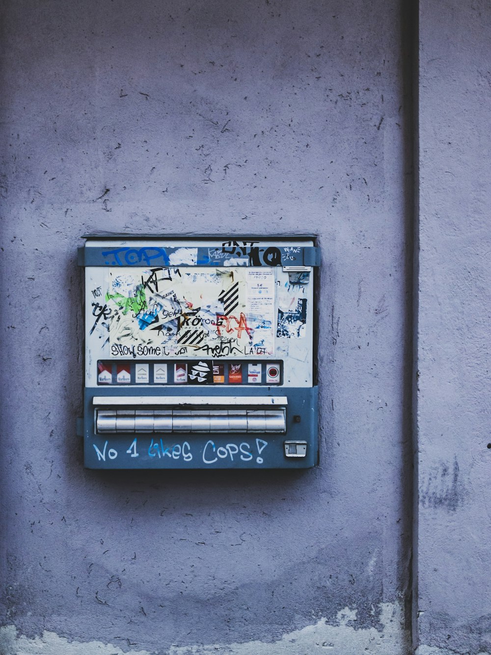 white and blue metal box