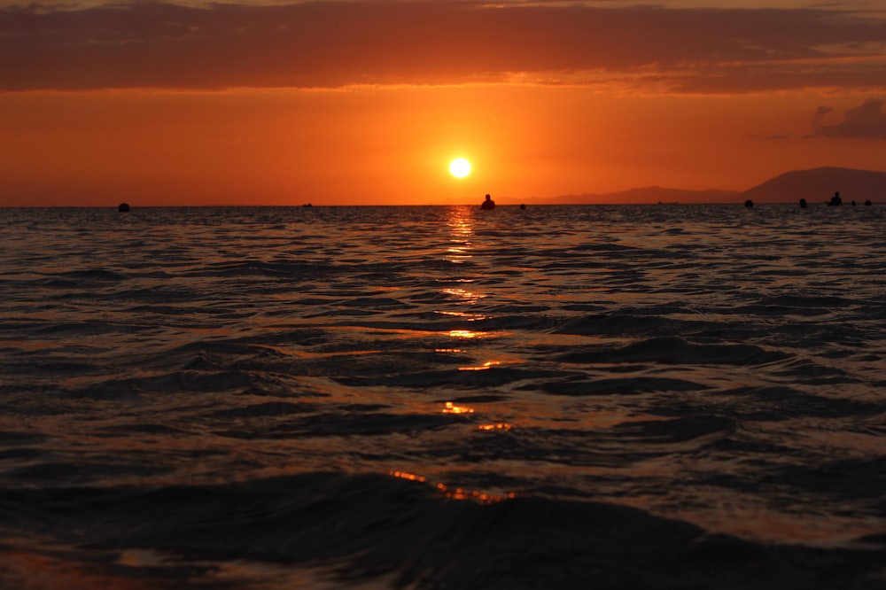 silhouette of man on beach