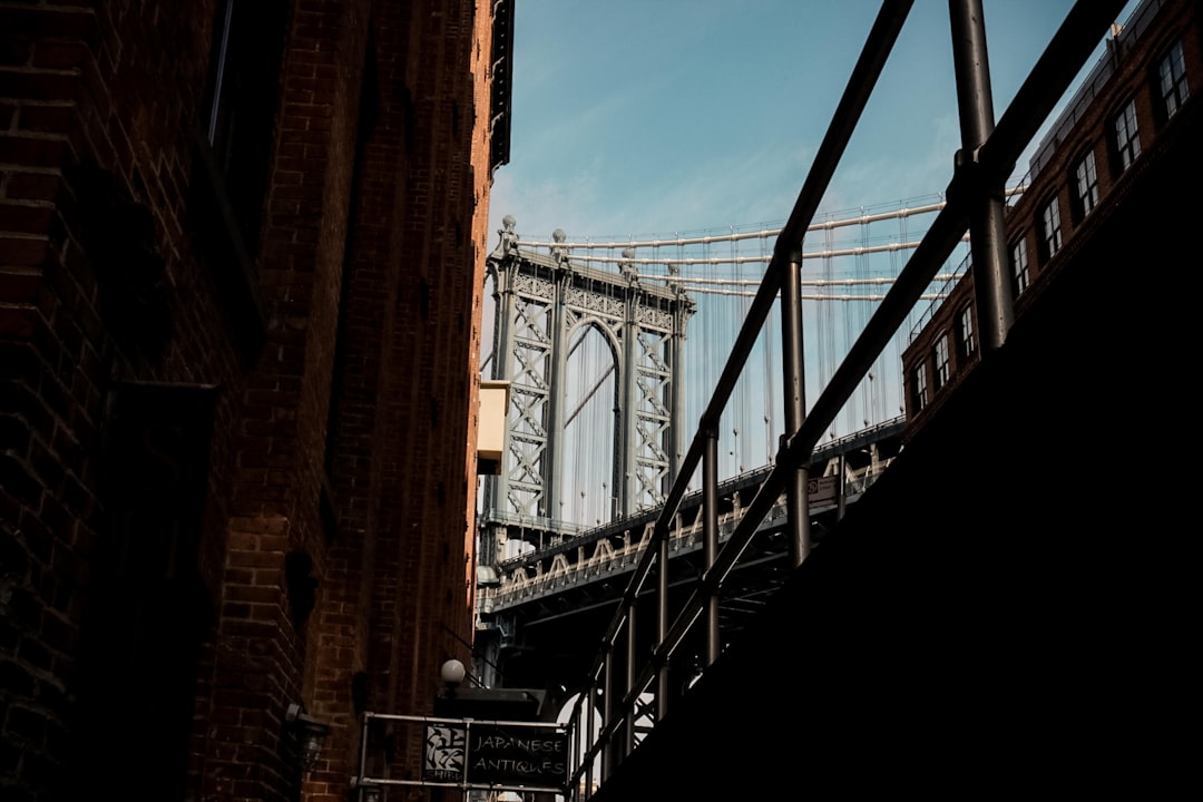low-angle photo of Manhattan bridge during daytime