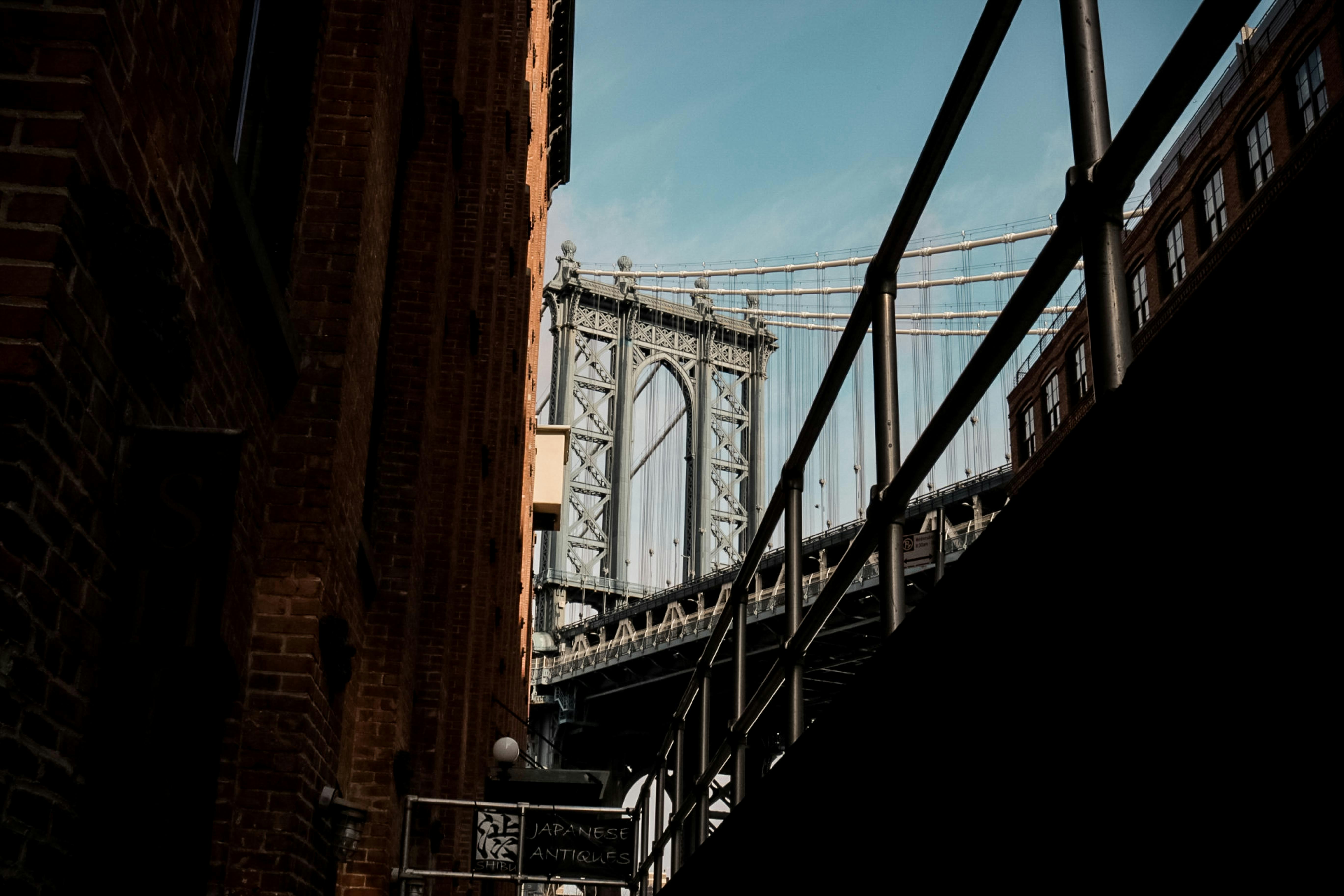 low-angle photo of Manhattan bridge during daytime