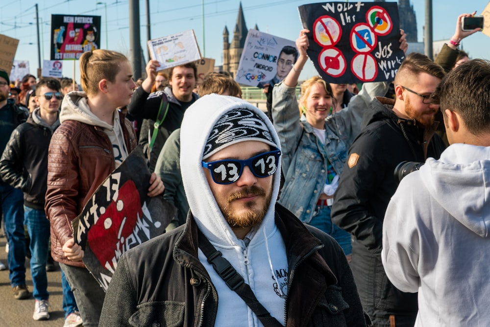 crowd of people at the street rallying